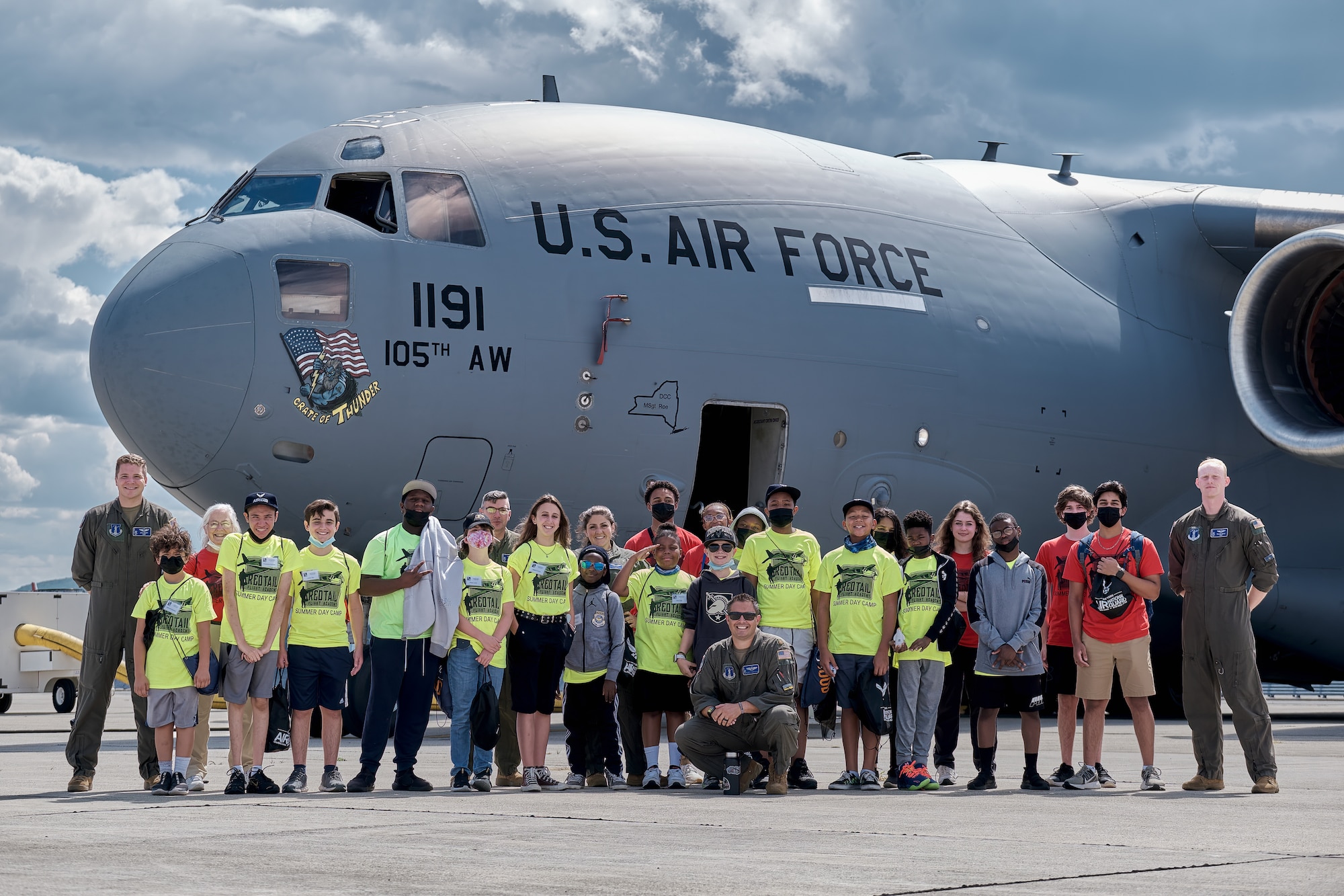 Students stand in front of C-17.