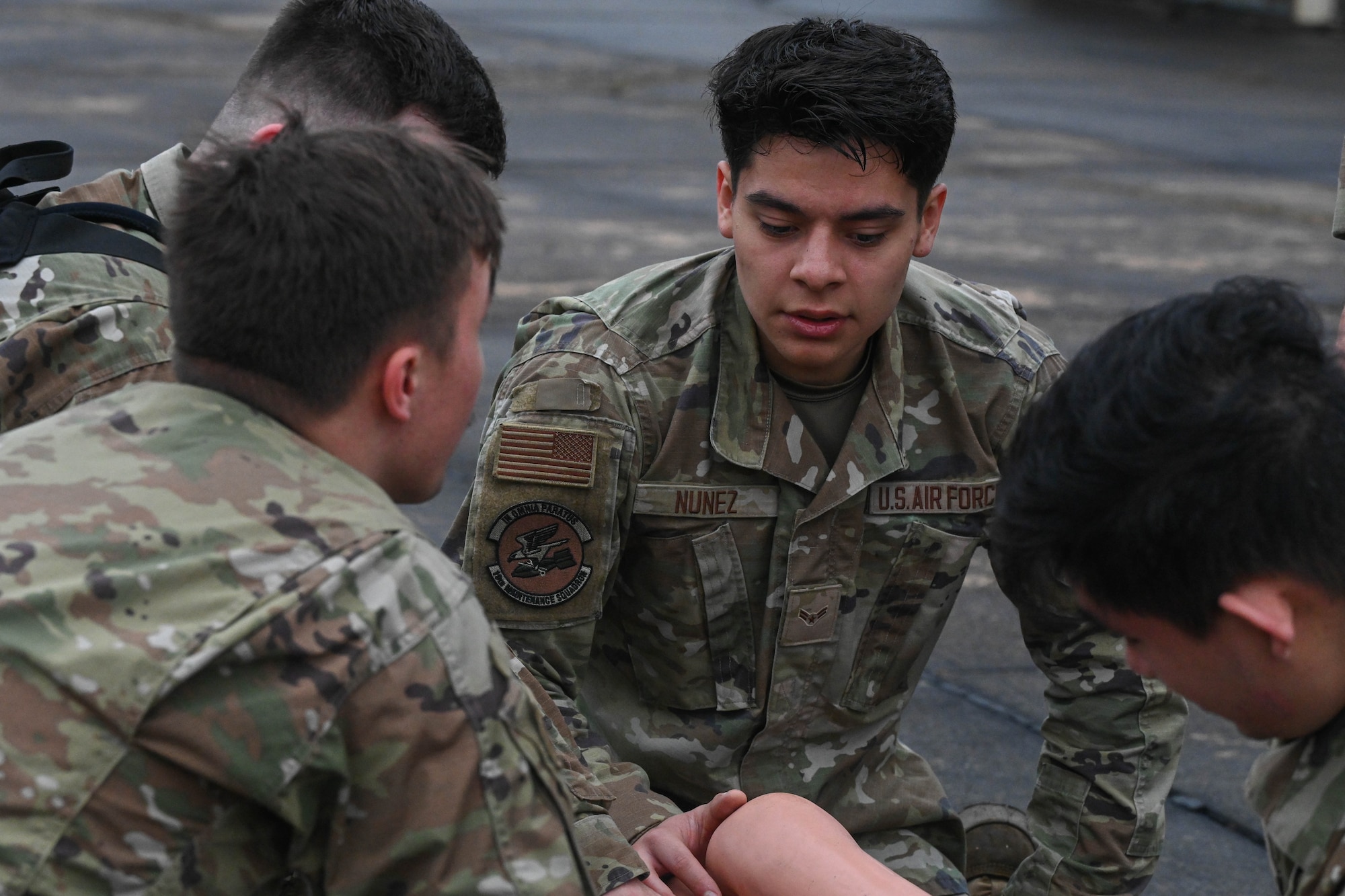 Airmen assigned to the 19th Maintenance Squadron perform Tactical Combat Casualty Care during the Readiness Games at Little Rock Air Force Base, Arkansas.