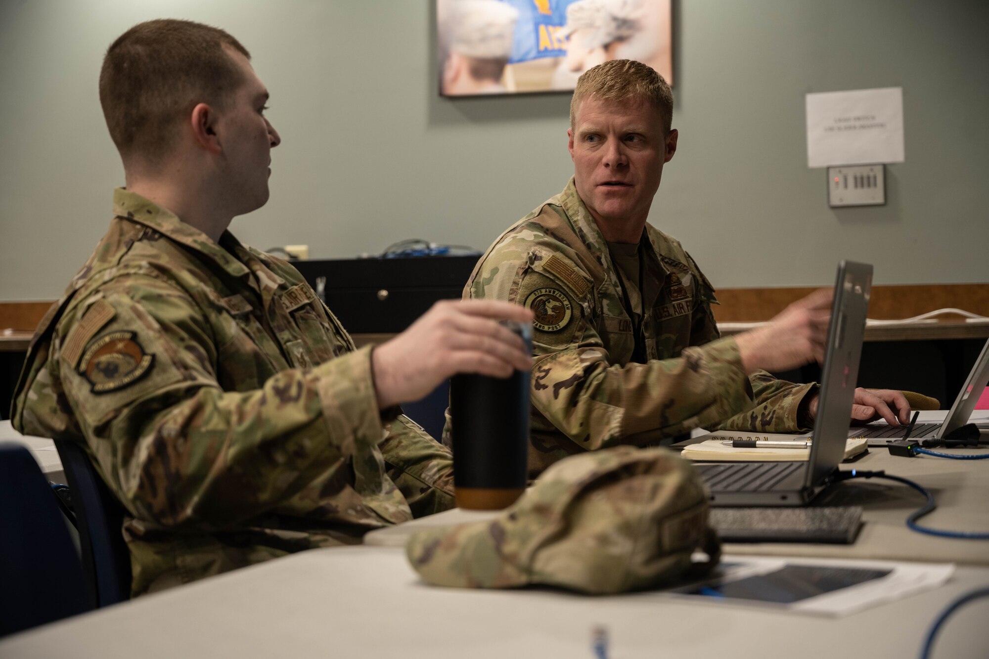 Airmen speak to each other