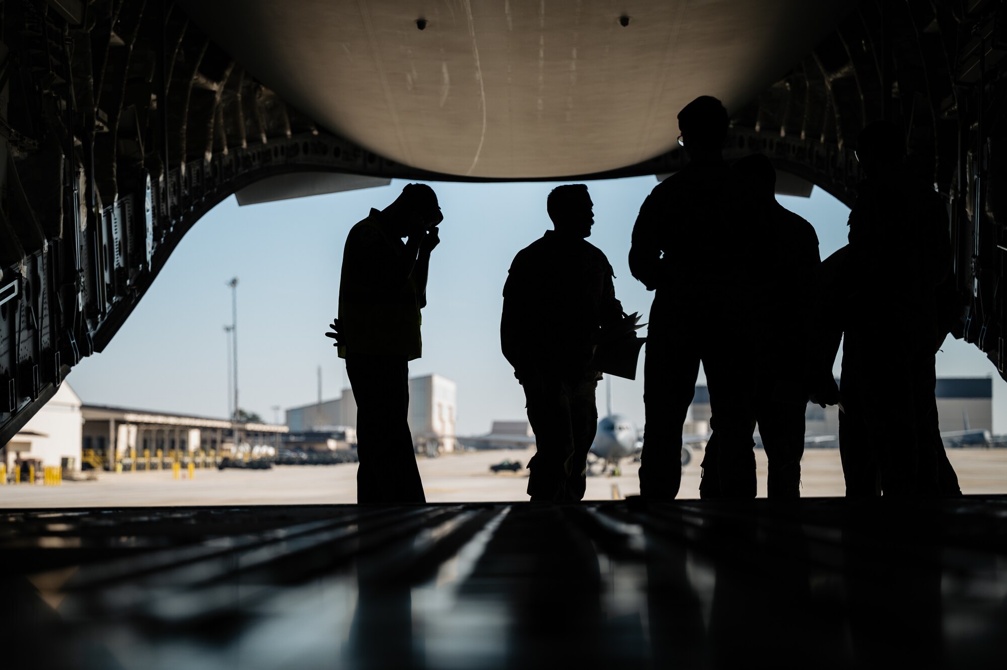 The joint exercise included the loading and offloading of equipment and vehicles onto a C-17, as well as various inspections and documentation. Exercises like these are made possible by the leveraging of assets of Joint Force partners across the Department of Defense’s only tri-service base.  (U.S. Air Force photo by Senior Airman Sergio Avalos)
