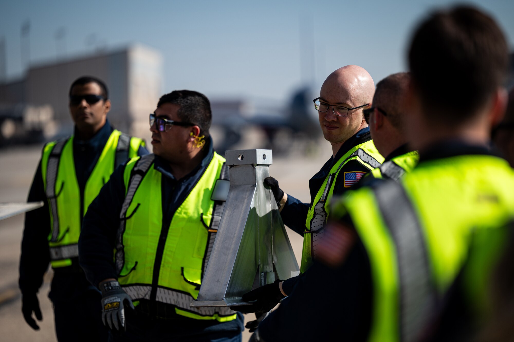 The joint exercise included the loading and offloading of equipment and vehicles onto a C-17, as well as various inspections and documentation. Exercises like these are made possible by the leveraging of assets of Joint Force partners across the Department of Defense’s only tri-service base.  (U.S. Air Force photo by Senior Airman Sergio Avalos)