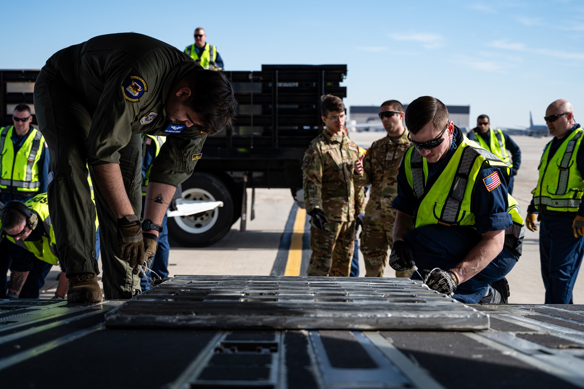 The joint exercise included the loading and offloading of equipment and vehicles onto a C-17, as well as various inspections and documentation. Exercises like these are made possible by the leveraging of assets of Joint Force partners across the Department of Defense’s only tri-service base.  (U.S. Air Force photo by Senior Airman Sergio Avalos)