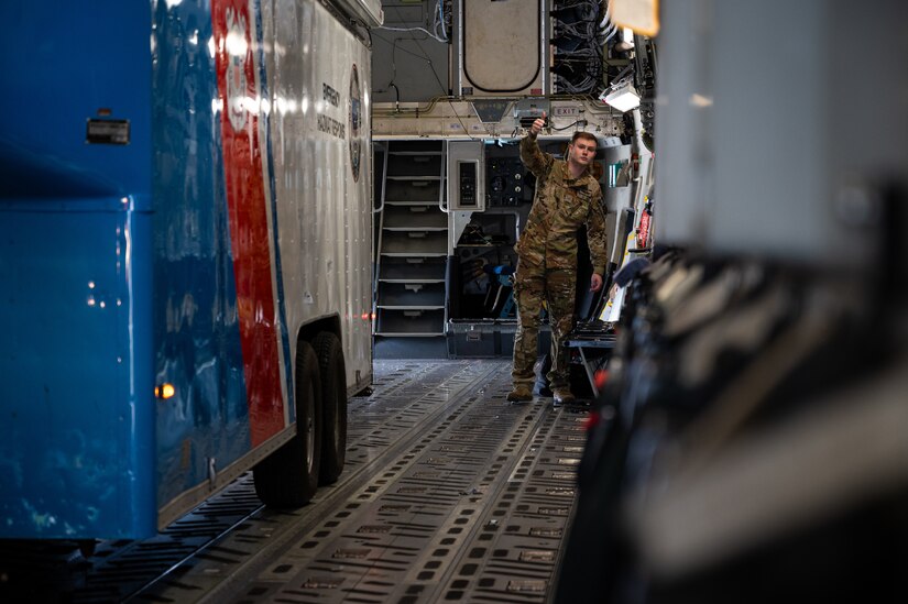 The joint exercise included the loading and offloading of equipment and vehicles onto a C-17, as well as various inspections and documentation. Exercises like these are made possible by the leveraging of assets of Joint Force partners across the Department of Defense’s only tri-service base.  (U.S. Air Force photo by Senior Airman Sergio Avalos)