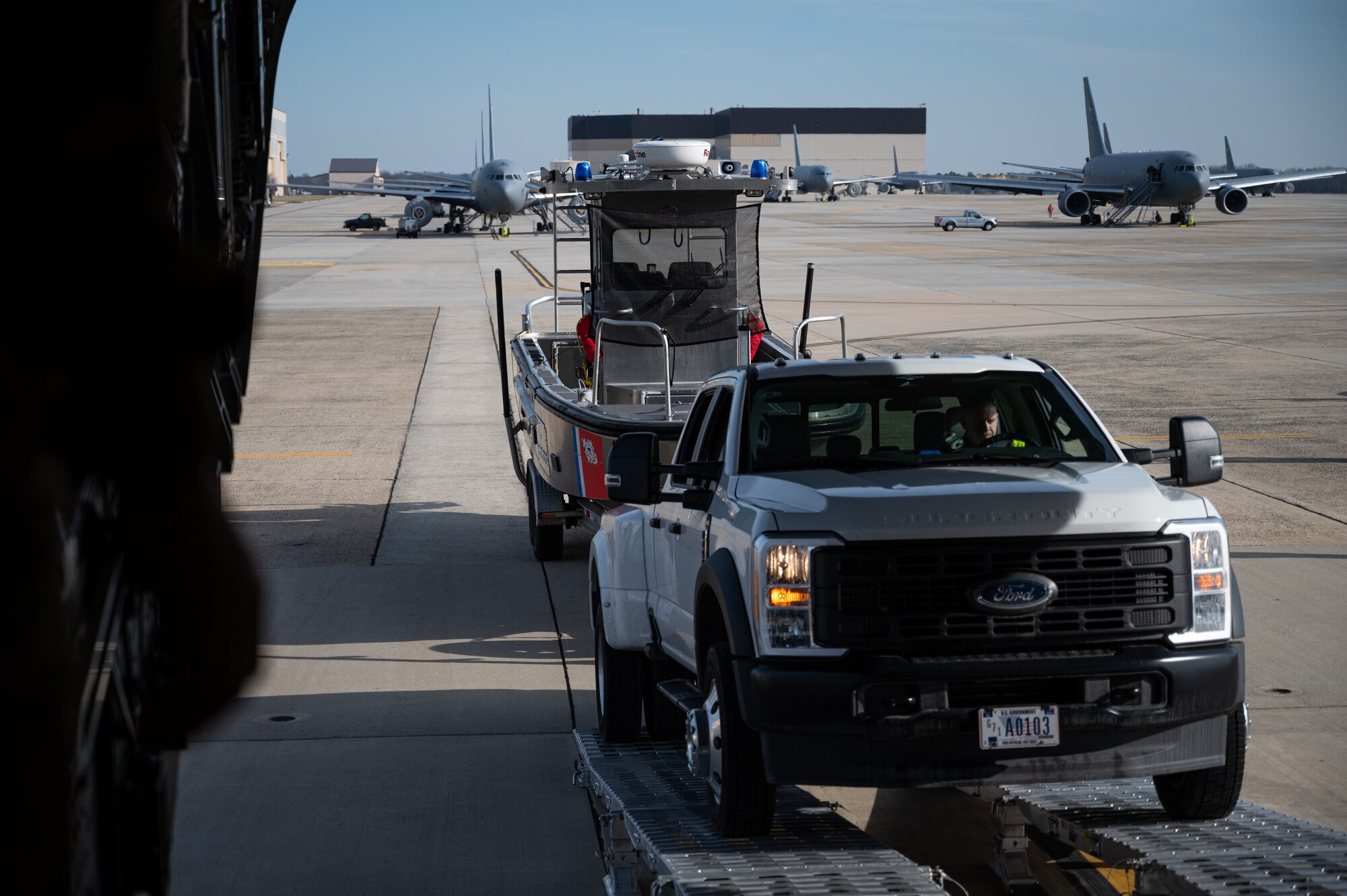 The joint exercise included the loading and offloading of equipment and vehicles onto a C-17, as well as various inspections and documentation. Exercises like these are made possible by the leveraging of assets of Joint Force partners across the Department of Defense’s only tri-service base.  (U.S. Air Force photo by Senior Airman Sergio Avalos)