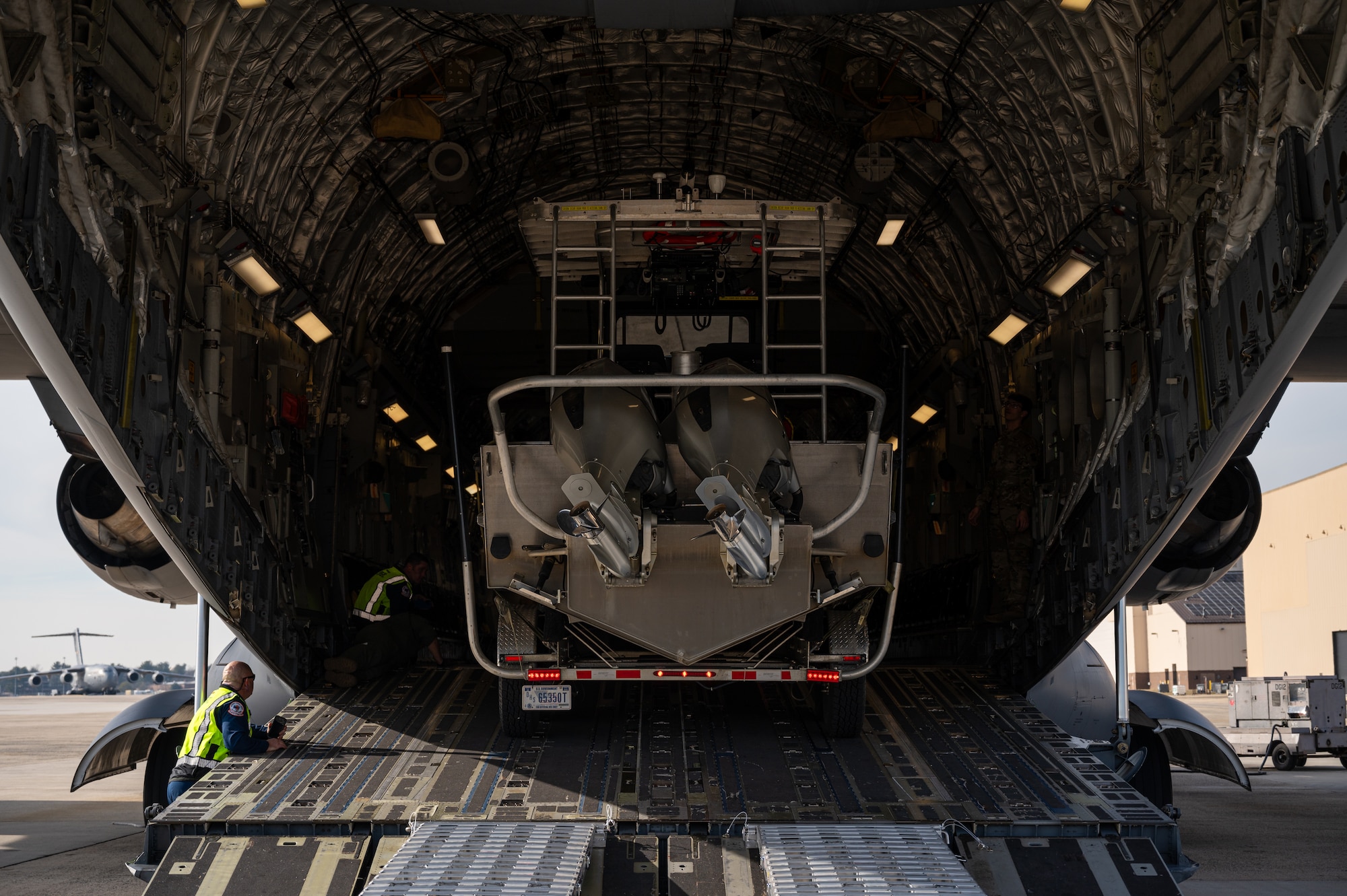 The joint exercise included the loading and offloading of equipment and vehicles onto a C-17, as well as various inspections and documentation. Exercises like these are made possible by the leveraging of assets of Joint Force partners across the Department of Defense’s only tri-service base.  (U.S. Air Force photo by Senior Airman Sergio Avalos)