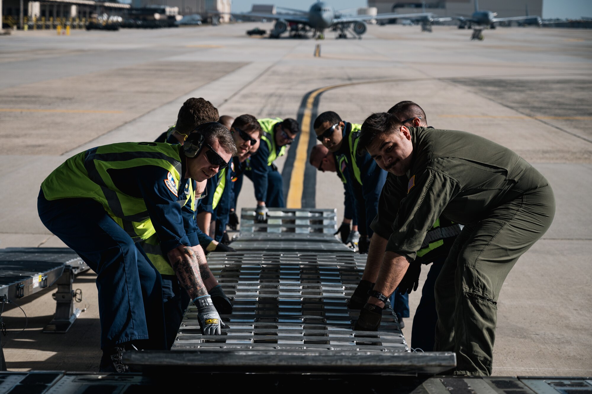 The joint exercise included the loading and offloading of equipment and vehicles onto a C-17, as well as various inspections and documentation. Exercises like these are made possible by the leveraging of assets of Joint Force partners across the Department of Defense’s only tri-service base.  (U.S. Air Force photo by Senior Airman Sergio Avalos)