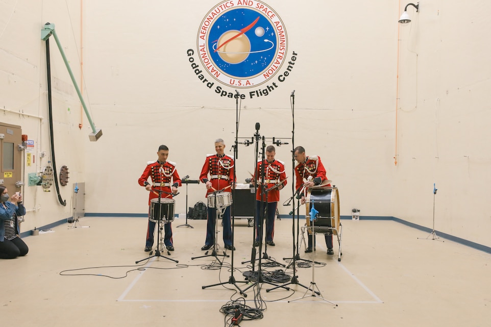 On May 3, 2023, the United States Marine Band performed in the acoustic testing chamber at Goddard Space Flight Center in Greenbelt, Md., to see if it could reach the volume that the Plankton, Aerosol, Cloud and ocean Ecosystem (PACE) spacecraft would be exposed to when launched by rocket into orbit.

As a part of the visit, musicians had the opportunity to test their sound in their instrument groups. Here, percussionists play as loud as they can while monitored by volume measuring devices. 

(U.S. Marine Corps photo by Master Gunnery Sgt. Amanda Simmons/released)