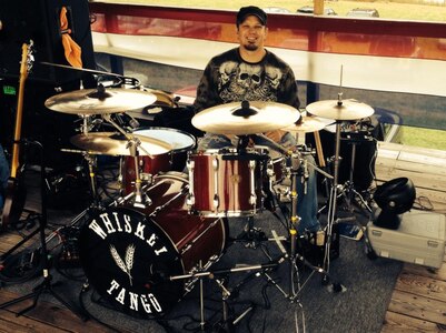 Photo of Steve Gardner sitting at his drum set