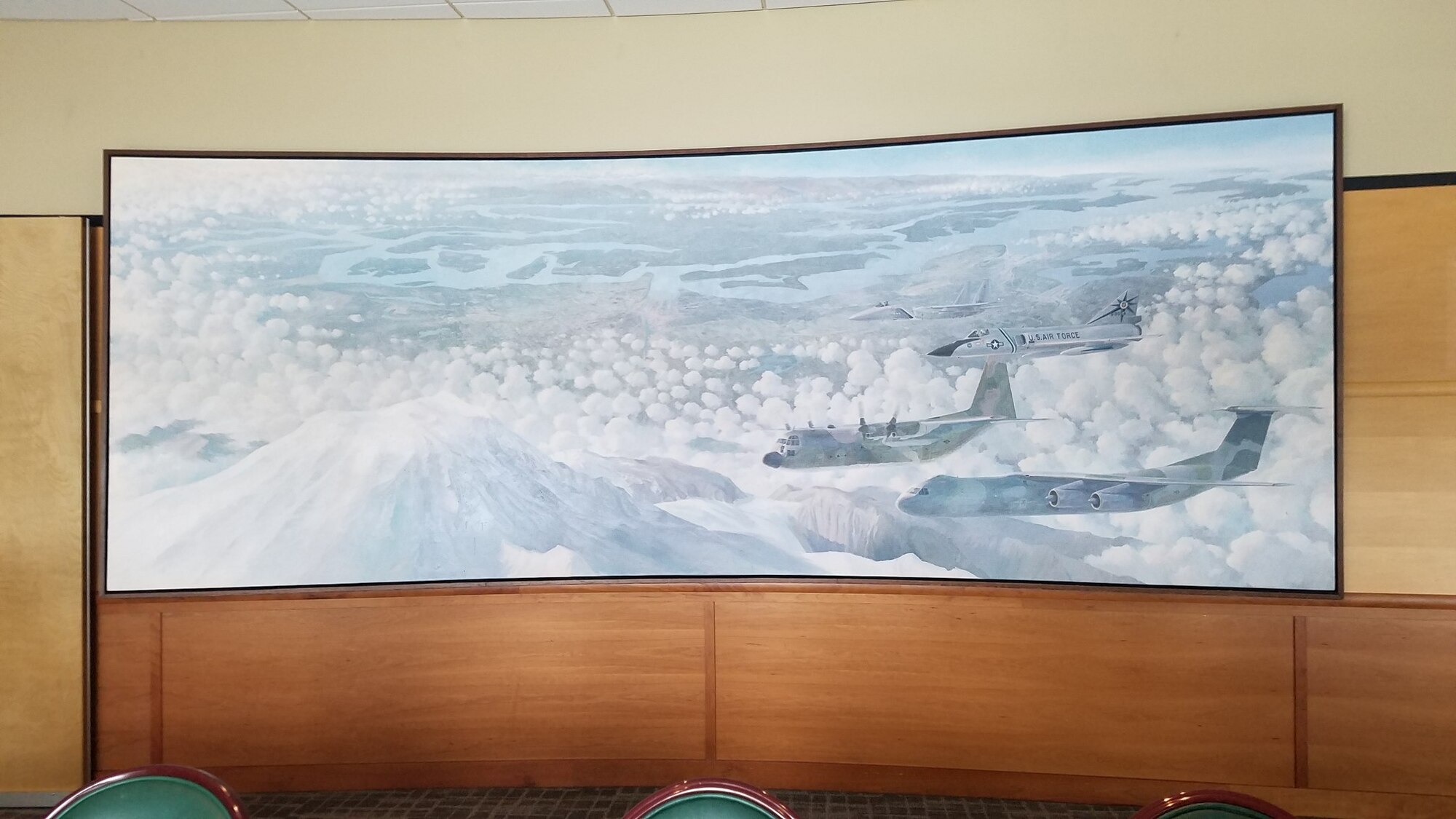 A painting titled “McChord Country” by Keith Ferris, a Hawaiian aviation artist, hangs inside the McChord Pub at Joint Base Lewis-McChord, Washington, Feb. 23, 2019. Ferris completed the painting in 1982, and after its completion it was placed in the McChord Pub for the next four decades. (Courtesy photo)