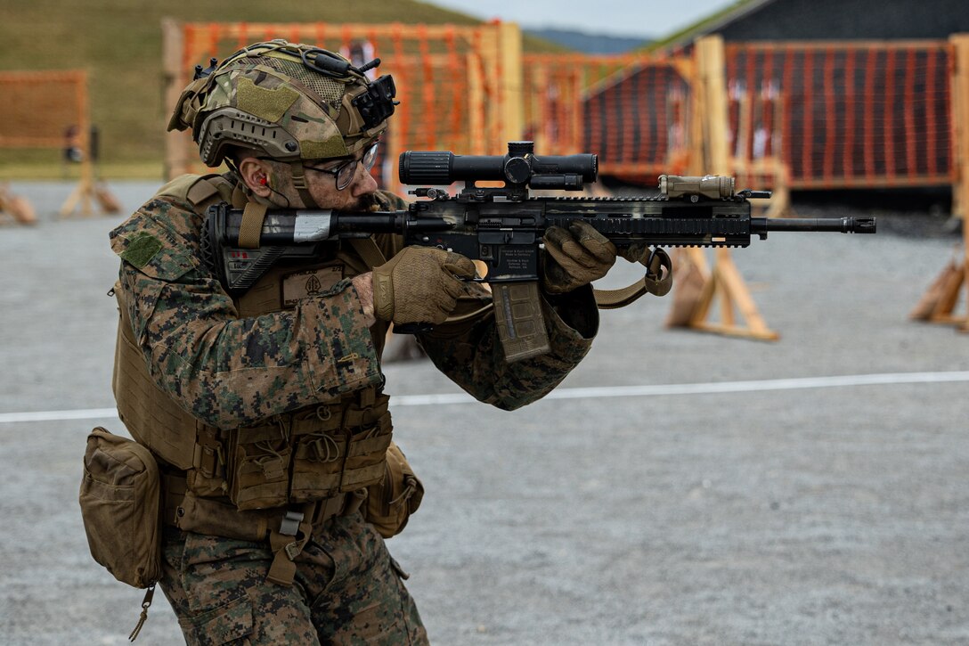 U.S. Marine Corps HM3 Wyatt Penland executes a timed shooting drill during the 3d Marine Division Squad Competition at Camp Hansen, Okinawa, Japan, Jan. 26, 2024. The competition tested the Marines across various combat-related tasks to evaluate each squad’s tactical proficiency, mental and physical endurance, and decision-making skills to determine the Division’s most proficient and capable rifle squad. Penland, a native of Georgia, is a corpsman with 2d Battalion, 2d Marine Regiment. 2/2 is forward deployed in the Indo-Pacific under 4th Marine Regiment, 3d Marine Division as part of the Unit Deployment Program. (U.S. Marine Corps photo by Cpl. Eduardo Delatorre)