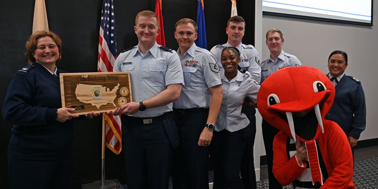 17th Operational Medical Readiness Squadron Airmen pose for a group photo with 17th Training Wing leadership during the 17th TRW 4th Quarterly Awards Ceremony at the Powell Event Center, Goodfellow Air Force Base, Texas, Feb. 2, 2024. Quarterly awards were awarded to Airmen and civilians in 12 categories to recognize the recipients' exceptional work. (U.S. Air Force photo by Airman 1st Class Evelyn J. D'Errico)