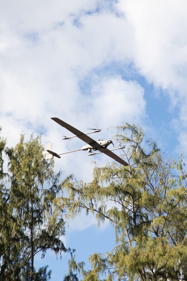 A Stalker VXE30 unmanned aerial system conducts a vertical take-off during a training evolution at Marine Corps Training Area Bellows, Hawaii, Jan. 23, 2024. During the training, 3d Littoral Combat Team, 3d Marine Littoral Regiment, 3d Marine Division experimented with the Littoral Reconnaissance Team concept while operating multiple advanced data collection systems and assets, such as the Stalker VXE30 small unmanned aerial system. (U.S. Marine Corps photo by Sgt. Jacqueline C. Parsons)