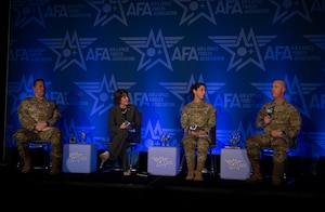 .S. Space Force Nicole Petrucci, commander of Space Delta 3 – Space Electromagnetic Warfare (second from right), and Col. Andrew Menschner, commander of Position, Navigation, and Timing Delta (Provisional), answer questions about the opportunities and lessons learned that they’ve faced in becoming Integrated Mission Deltas at the Air & Space Forces Association Warfare Symposium in Aurora, Colorado, Feb. 13, 2024. The objective of becoming an IMD is to organize all aspects of mission area readiness – personnel, equipment, training, and sustainment – into a single organization. (U.S. Space Force photo by John Ayer)
