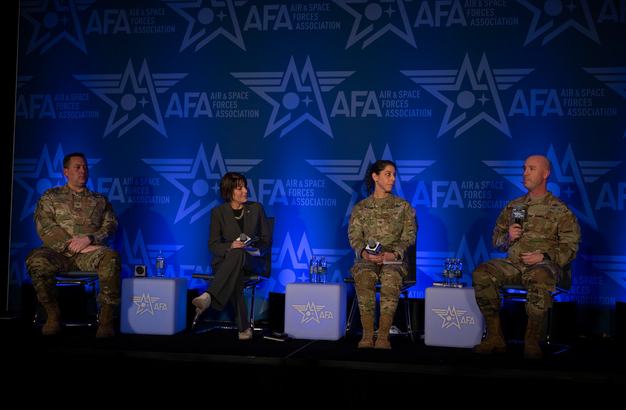 .S. Space Force Nicole Petrucci, commander of Space Delta 3 – Space Electromagnetic Warfare (second from right), and Col. Andrew Menschner, commander of Position, Navigation, and Timing Delta (Provisional), answer questions about the opportunities and lessons learned that they’ve faced in becoming Integrated Mission Deltas at the Air & Space Forces Association Warfare Symposium in Aurora, Colorado, Feb. 13, 2024. The objective of becoming an IMD is to organize all aspects of mission area readiness – personnel, equipment, training, and sustainment – into a single organization. (U.S. Space Force photo by John Ayer)