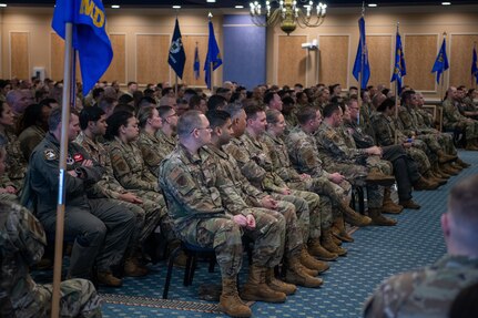 group of Airmen sitting in audience