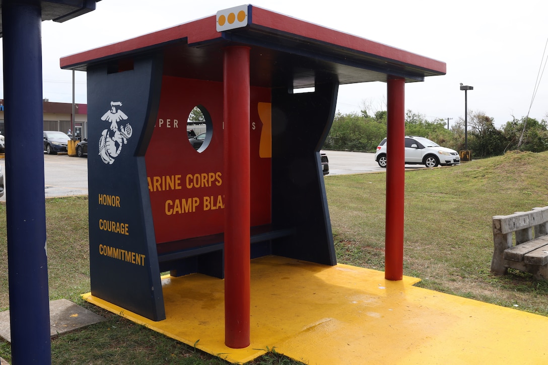 U.S. Marines with Marine Corps Base (MCB) Camp Blaz revisited a bus stop originally painted in 2021 to revitalize its color and design Dededo, Guam, Feb. 5, 2024. MCB Camp Blaz partnered with the Dededo Mayor’s Office to touch up the bus stop across from its current home on NCTS Guam as one of its island beautification Projects. Community service and volunteer events allow service members to build and foster relationships with the community while also giving back to it. (U.S. Marine Corps photo by LCpl. Ryan Little)