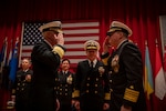 Vice Adm. Karl Thomas, left, turns over command of Commander, U.S. 7th Fleet to Vice Adm. Fred Kacher, right, during the U.S. 7th Fleet Change of Command ceremony onboard Commander, Fleet Activities Yokosuka, Feb. 15.