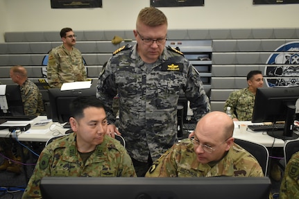 Members of United States Forces Japan, Japan Joint Staff, and Australian Defence Force coordinate plans during Exercise Keen Edge 24 at the Bilateral Joint Operations Coordination Center on Yokota Air Base, Japan, Feb. 1, 2024. Historically a bilateral JJS and U.S. Indo-Pacific Command exercise that allows the United States and Japan to practice coordination procedures, this iteration will also include the participation of Australia for the first time, further highlighting the multinational commitment to a free and open Indo-Pacific region. KE24 is scheduled to continue through to Feb. 8, one of many annual U.S.-Japan operations and exercises that increases readiness to respond to a variety of crises and contingencies, maintaining the Alliance as a credible deterrence in an increasingly complex threat environment.