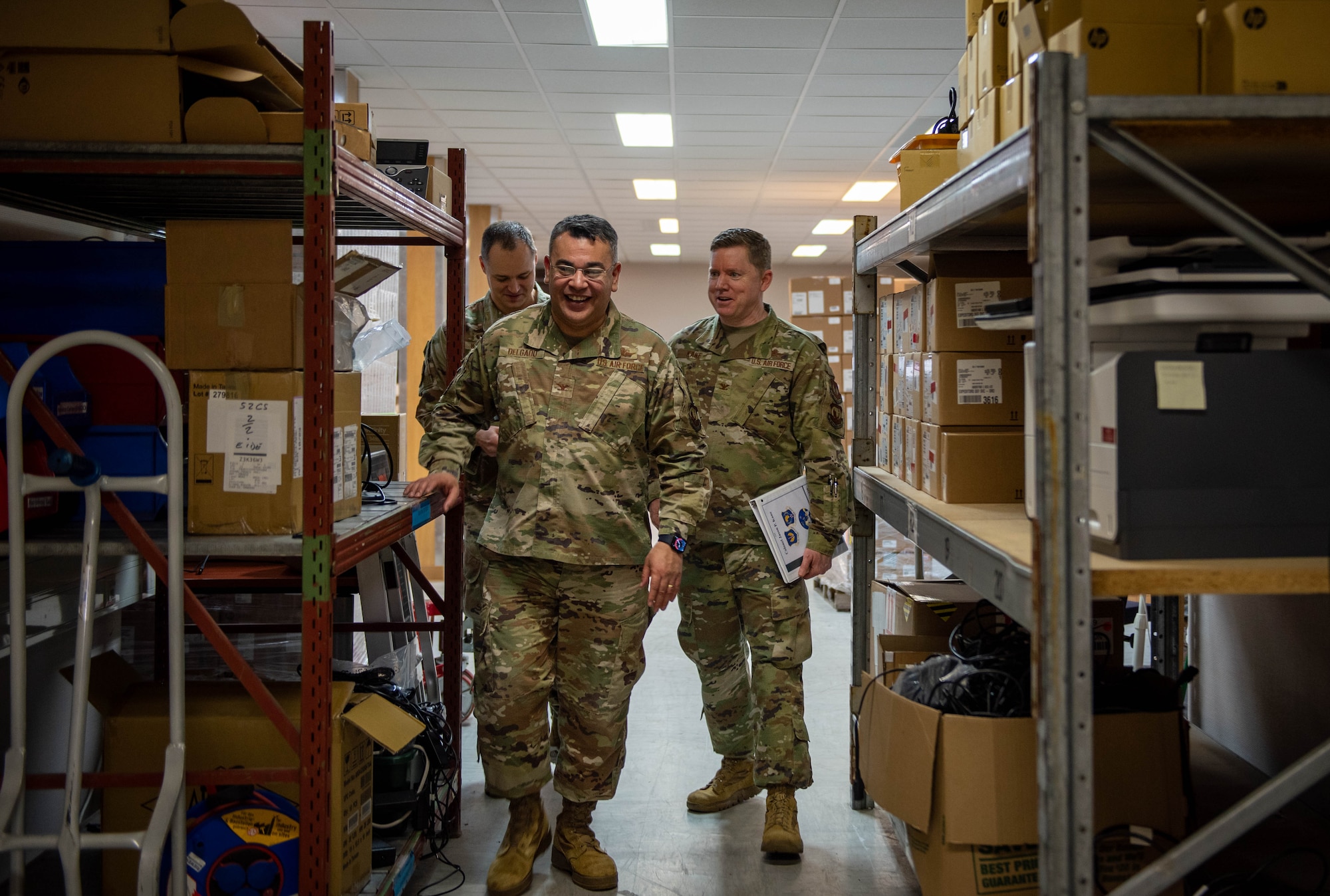 U.S. Air Force Col. Oscar Delgado, U.S. Air Forces in Europe - Air Forces in Africa A6 director, Col. Jason Kane, USAFE-AFAFRICA A6 deputy director and Lt. Col. Thomas Heisel, 52nd Communications Squadron commander, view a storage facility during a base visit at Spangdahlem Air Base, Germany, Jan. 24, 2024.