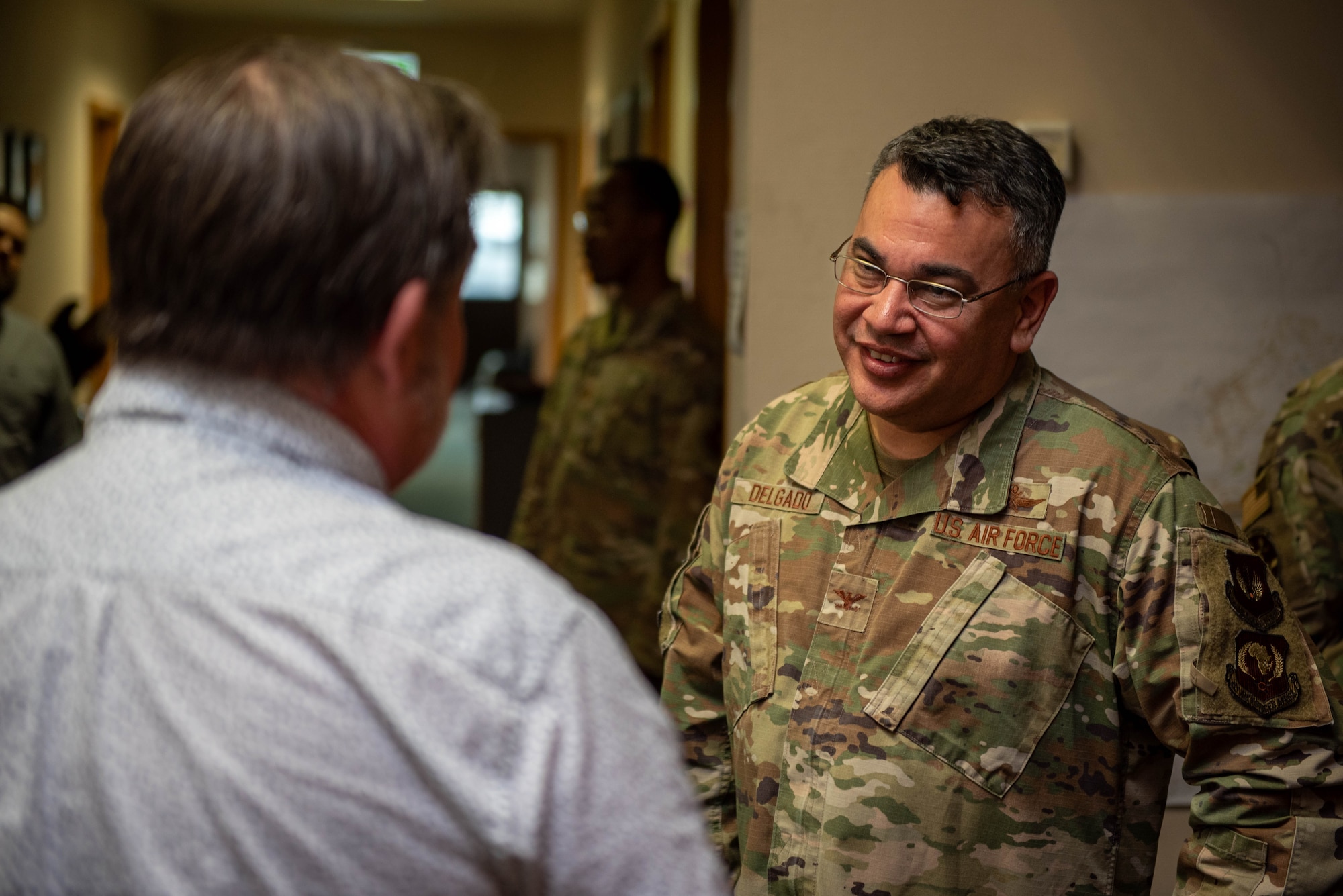 U.S. Air Force Col. Oscar Delgado, the U.S. Air Forces in Europe - Air Forces in Africa A6 director, speaks to members of 52nd Communications Squadron during a base visit at Spangdahlem Air Base, Germany, Jan. 24, 2024