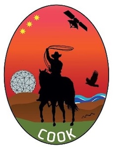 logo of silhouette of cowboy with a lasso and radome in background with "COOK" across the bottom