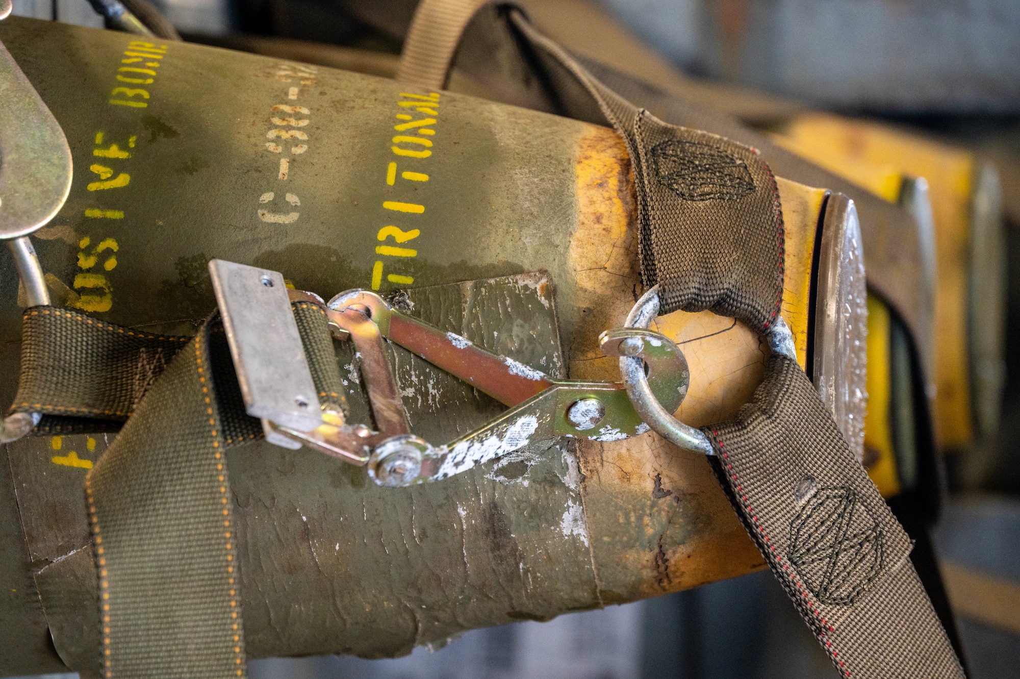 An asset sits secured aboard a C-17 Globemaster III