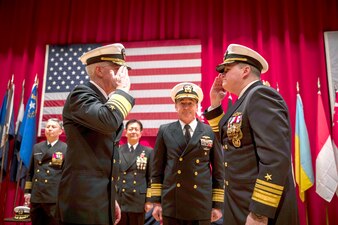 Vice Adm. Karl Thomas, left, turns over command of U.S. 7th Fleet to Vice Adm. Fred Kacher, right, during a change of command ceremony at Fleet Activities Yokosuka.