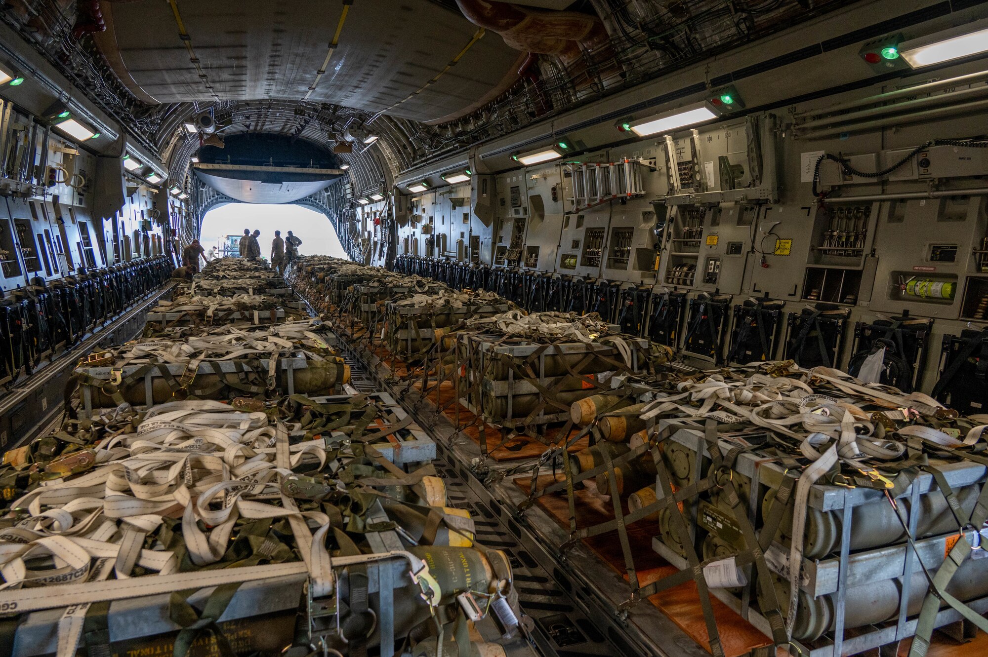 Pallets of assets sit secured aboard a C-17 Globemaster III