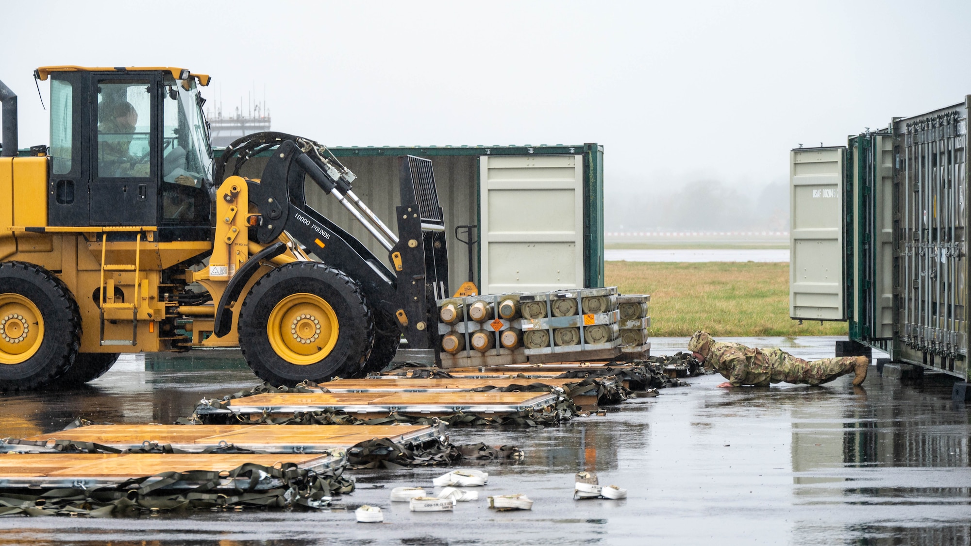 Airmen build pallets for airlift transport