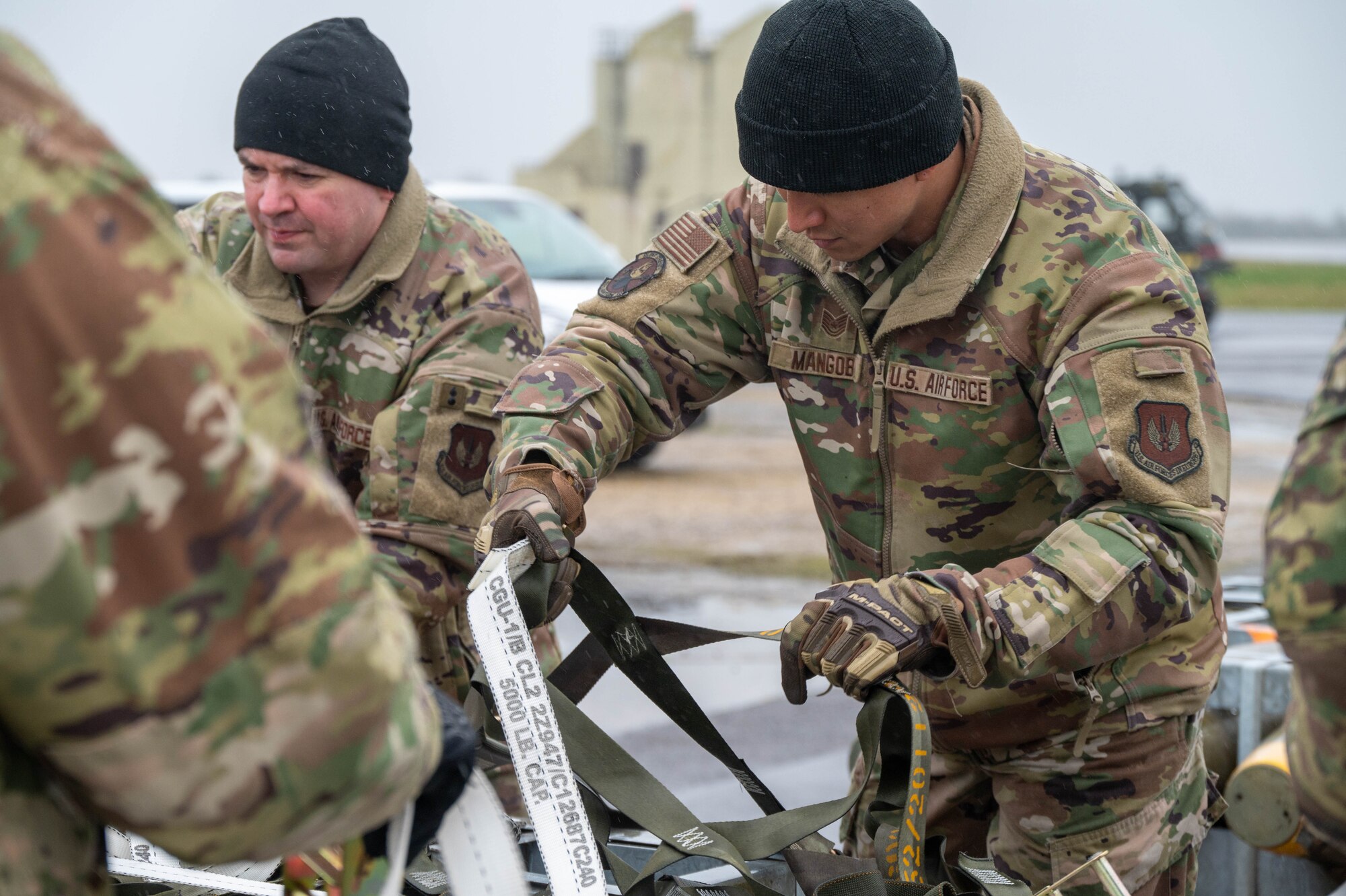 Airmen build pallets for airlift transport