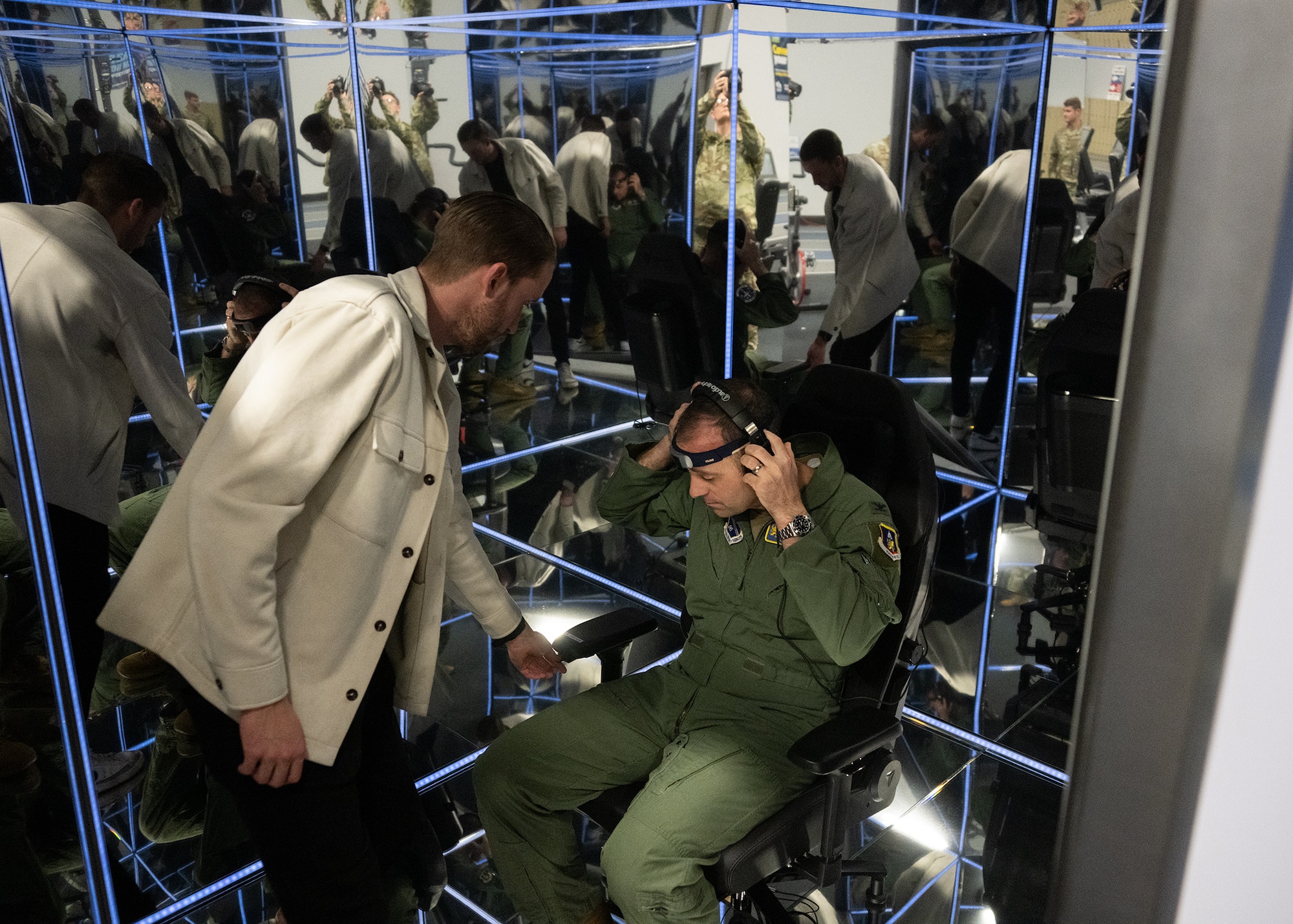 Brandon Murphy, left, head of growth at Lumena, helps U.S. Air Force Col. Parkin C. “Gage” Bryson, 316th Wing deputy commander, prepare for a MindGym session at the Tactical Fitness Center at Joint Base Andrews, Md., Feb. 9, 2024.