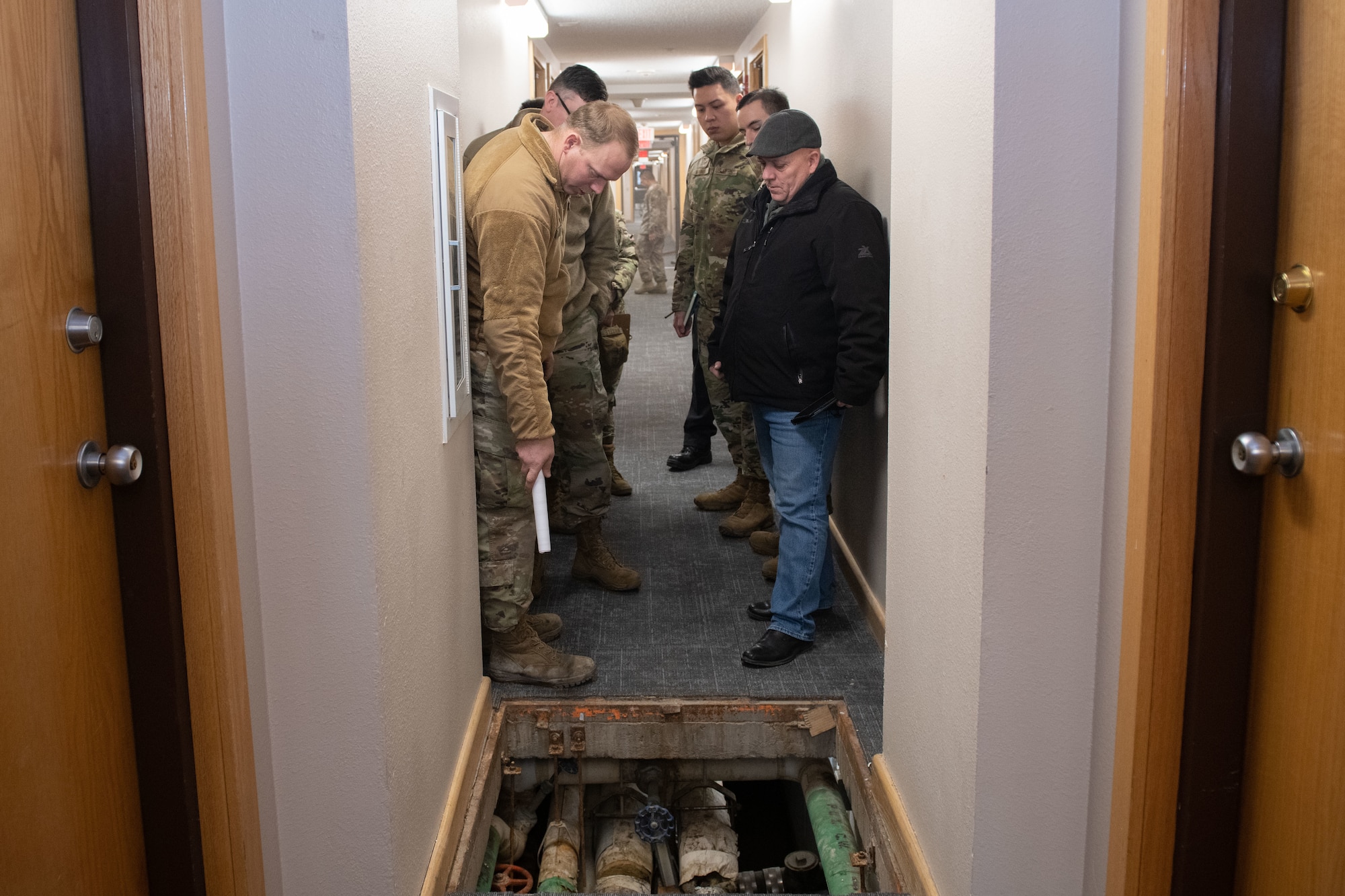 Airman observing water lines
