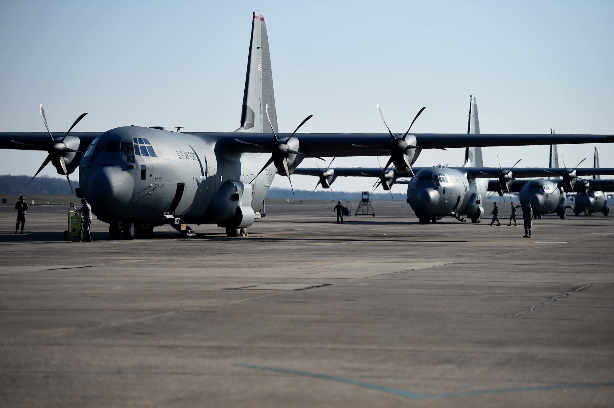 Six C-130s prepare for take-off Mar. 12, 2018 at Little Rock Air Force Base, Ark. Team Little Rock hosted over 65 Airmen from six wings to train together and showcase tactical airlift. Partnerships and interoperability enhance operational effectiveness and mission readiness. (U.S. Air Force photo by Staff Sgt. Dana J. Cable)