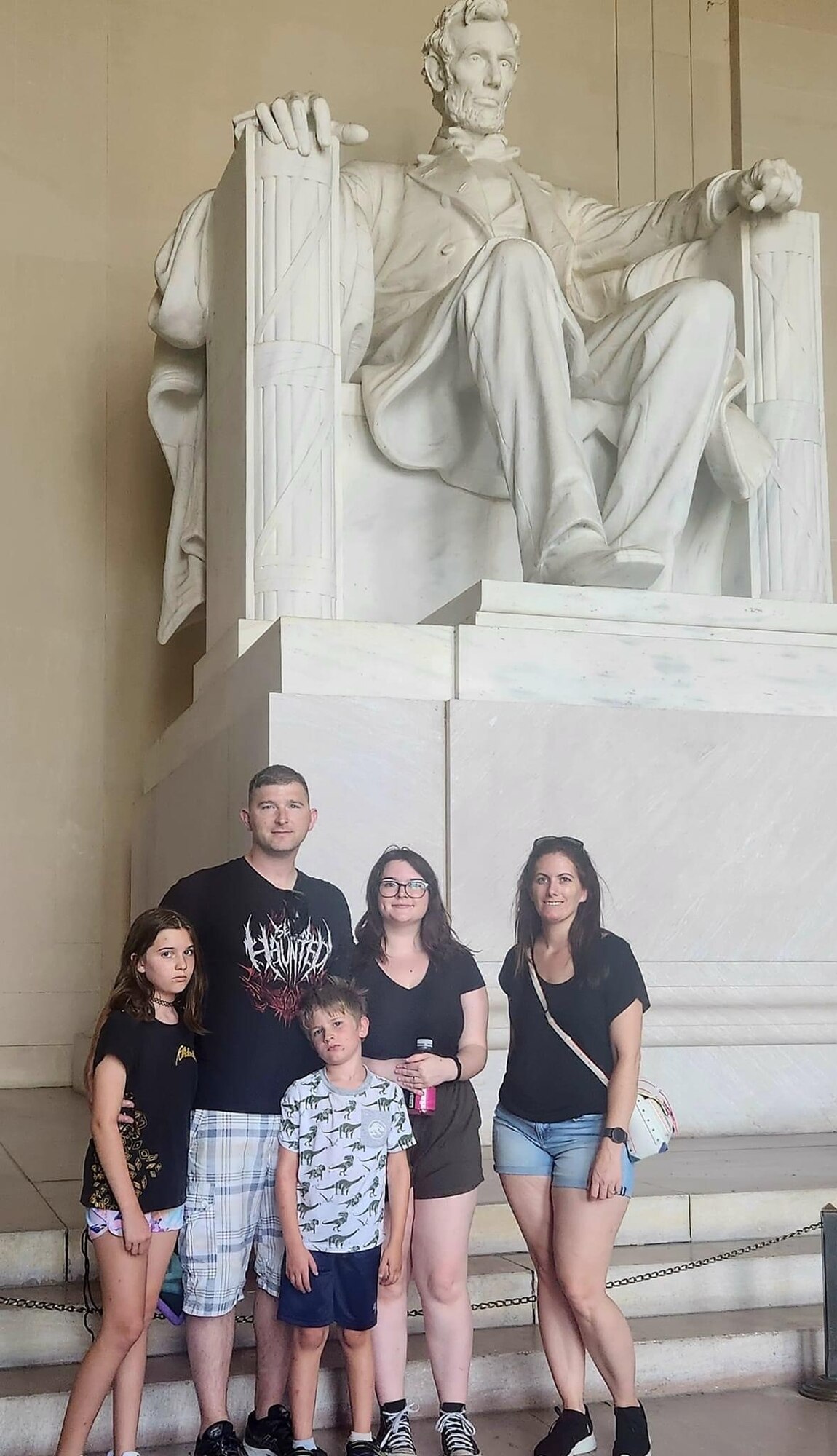 U.S. Air Force Tech. Sgt. Timothy Dailey, 1st Special Operations Security Forces Squadron noncommissioned officer in charge of standardization and evaluations, left, and Master Sgt. Melissa Dailey, 1st Special Operations Wing superintendent and wing executive admin, far right, poses for a photo with their family at the Abraham Lincoln Memorial in Washington, D.C. Dailey's family has had to learn to adjust to either parent being gone for extended periods of time. Their family has been able to utilize the multitude of resources Air Force Special Operations Command offers to ensure Air Commandos are taken care of in each aspect of their lives; professionally, physically, mentally, medically and spiritually, to be ready to perform mission essential duties at a moment’s notice. (Courtesy photo)