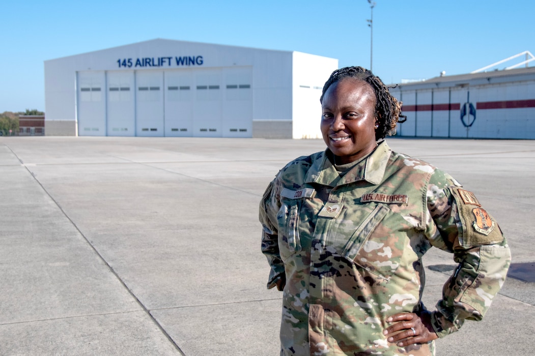 NCANG sergeant poses on 145th Airlift Wing's flightline.