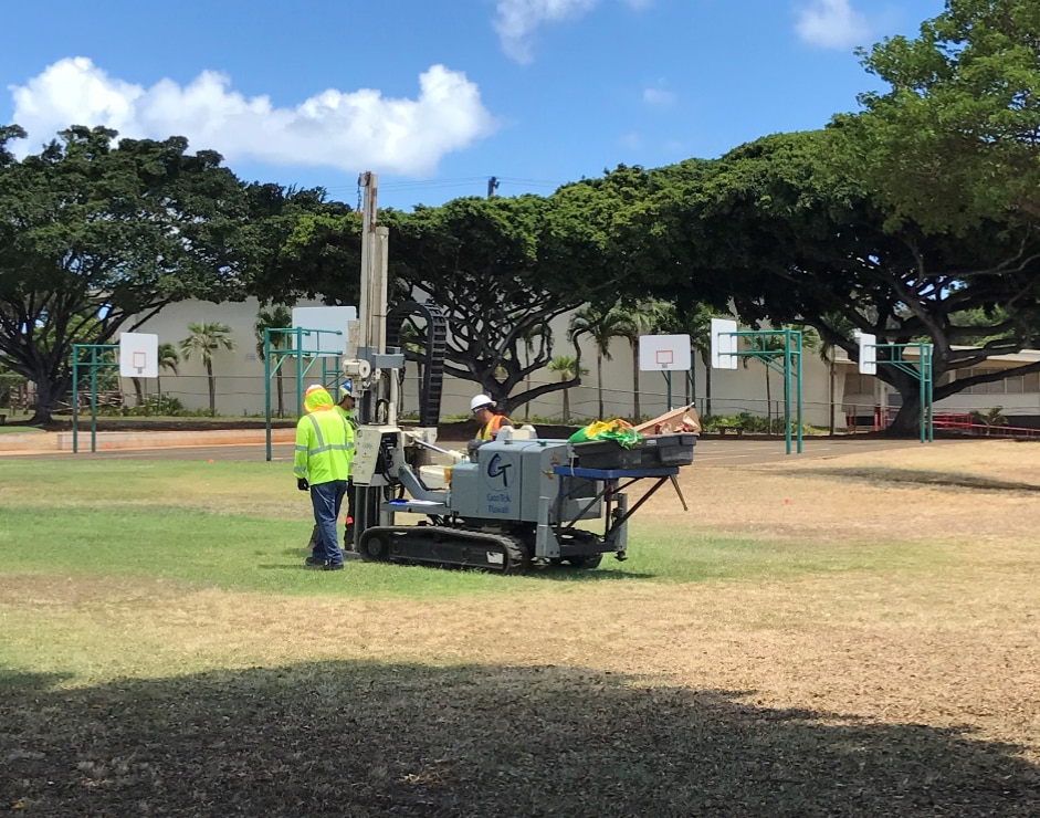 Contractors use a drill rig to take subsurface samples at the Makalapa Elementary School playground in 2017.