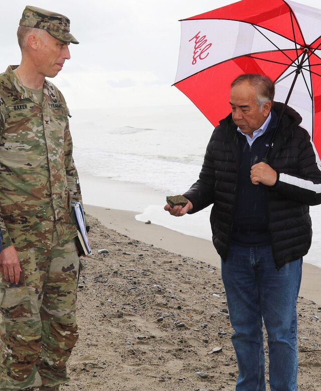 Col. Andrew Baker, commander of the U.S. Army Corps of Engineers Los Angeles District, left, and Victor Cabral, mayor of San Clemente, right, meet during a rainy Feb. 9 day near the San Clemente Pier in San Clemente, California. The two leaders met to discuss the next steps for the San Clemente Beach Nourishment project and address some of the city’s concerns.