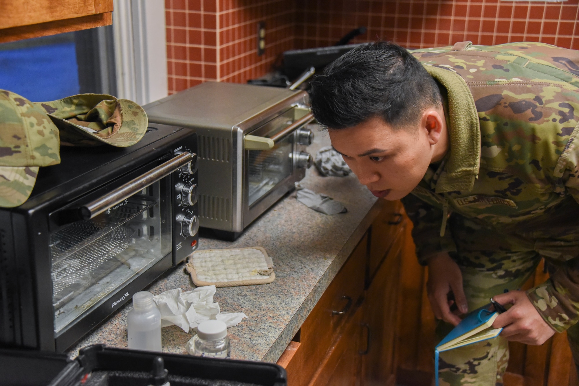 Airman inspects water sample