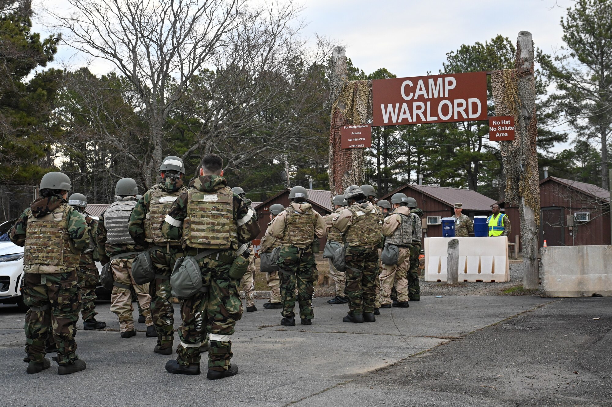 Airmen with CBRN gear prepare to enter Camp Warlord.