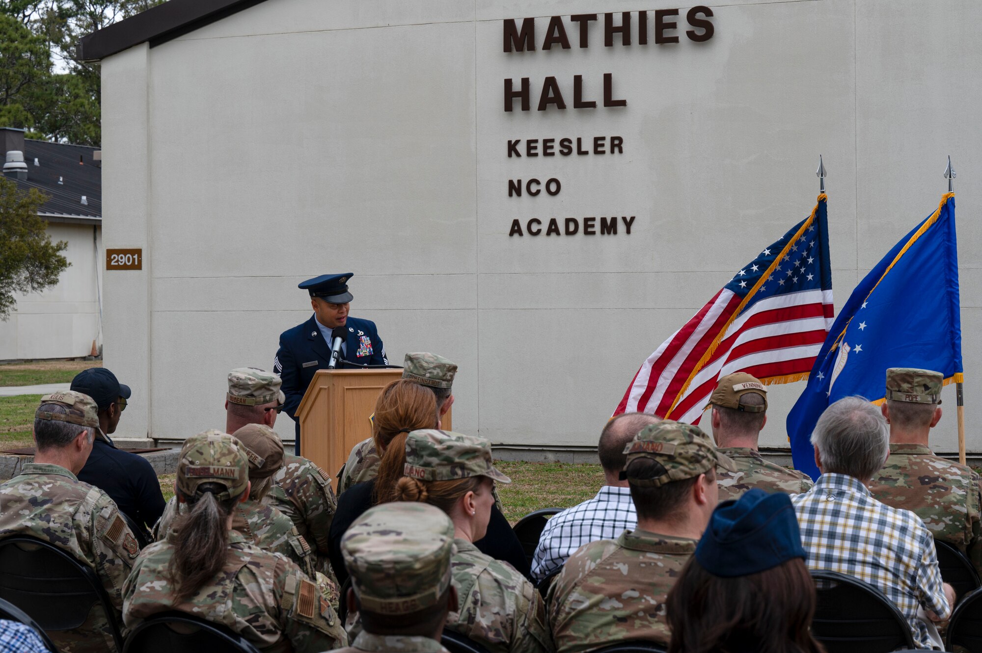 U.S. Air Force Chief Master Sgt. Jayar Dela Cruz, Mathies Noncommissioned Officer Academy commandant, gives a speech during the assumption of responsibility and ribbon cutting ceremony on Keesler Air Force Base, Mississippi, Feb. 8, 2024.