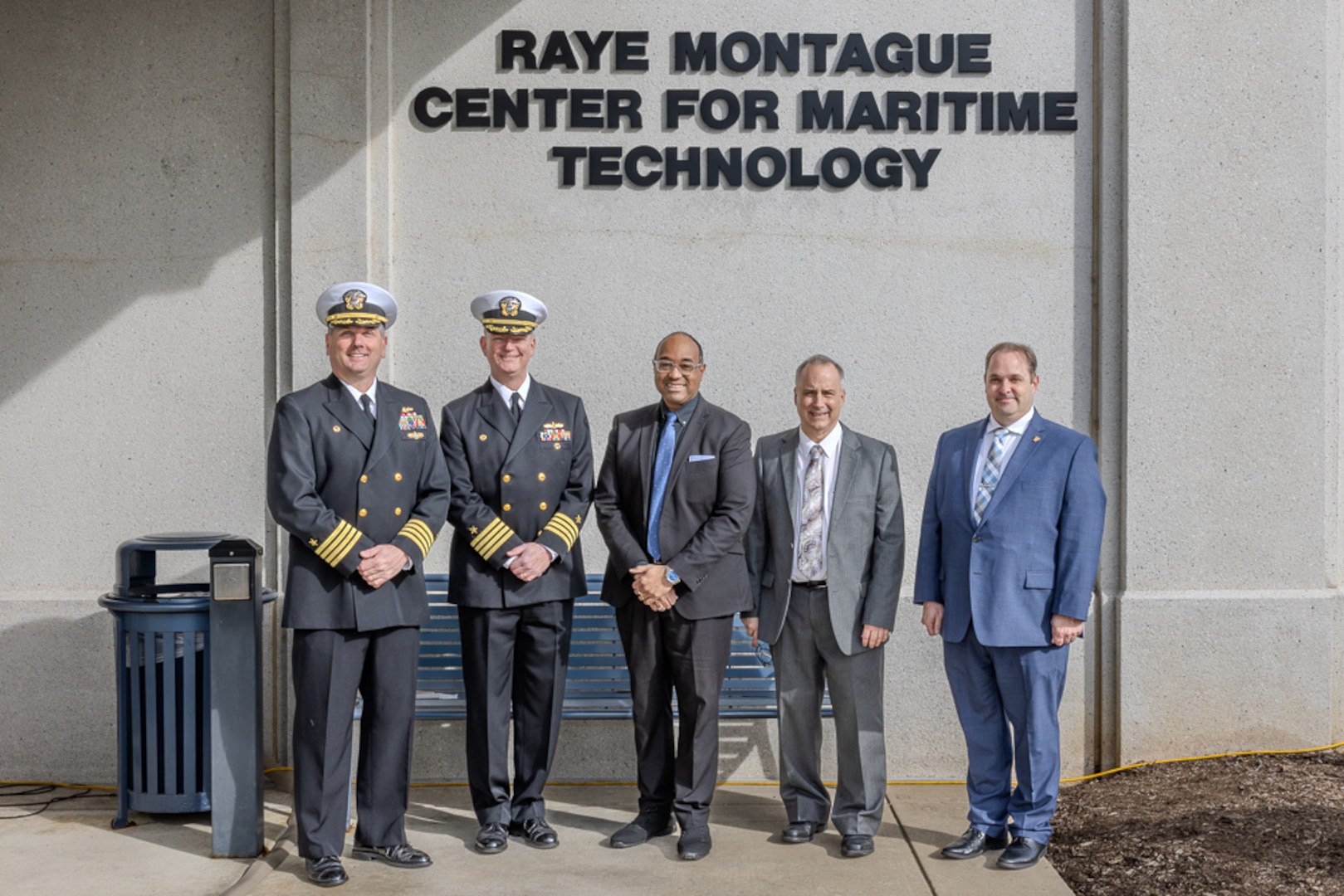 Naval Surface Warfare Center, Carderock Division Commanding Officer Capt. Matthew Tardy (left) and Technical Director Lawrence Tarasek, SES, (center right) take a photo with former Carderock Commanding Officer, Capt. Todd Hutchison (center left); Associate Vice Chancellor for Academic Affairs and Student Success at the University of Arkansas at Little Rock, Dr. David Montague (center); and Naval Sea Systems Command Warfare Centers Director, Marty Irvine.