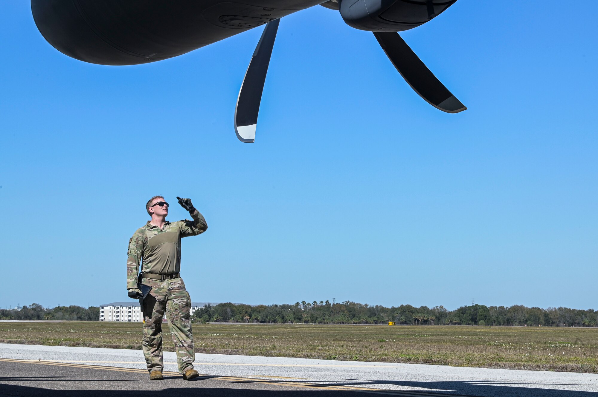 U.S. Air Force Staff Sgt. Christian Cambell, a 73rd Special Operations special mission aviator conducts pre-flight inspections on an AC-130J Ghostrider gunship during Agile Ghost at Hurlburt Field.