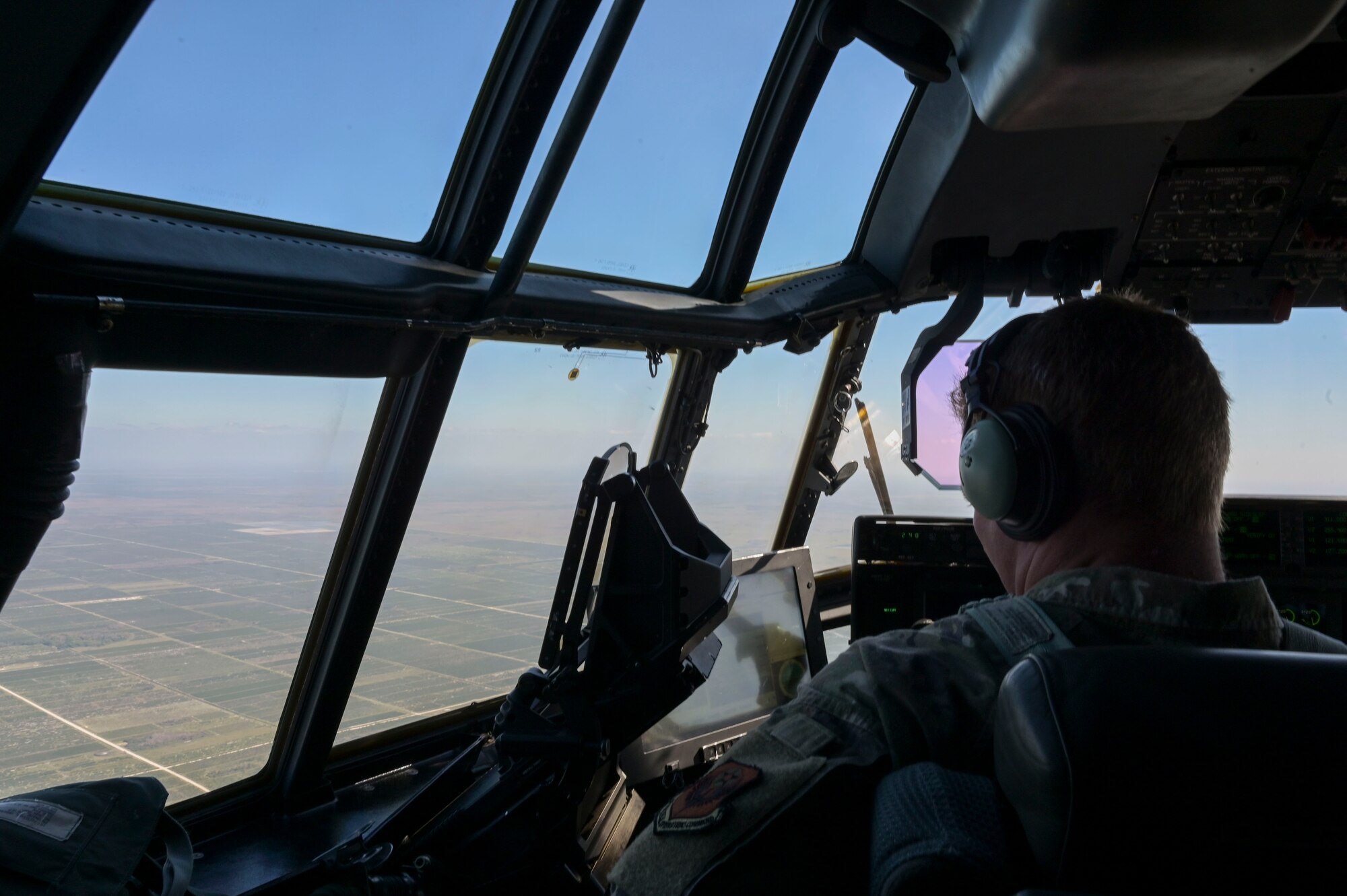 U.S. Air Force Maj. Zachary Masters, a 73rd Special Operations Squadron pilot physician, pilots an AC-130J Ghostrider gunship during Agile Ghost near Macdill Air Force Base
