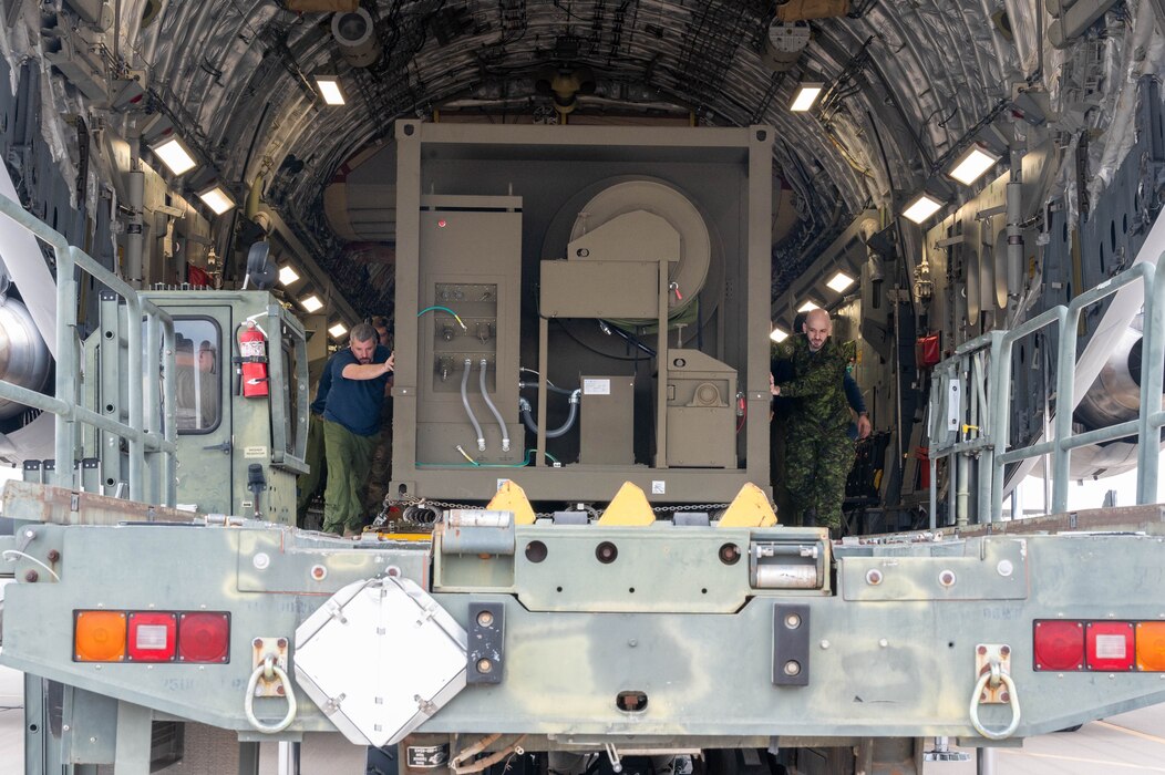 Royal Canadian Air Force airmen from 429 Transport Squadron and 42 Radar Squadron unload a AN/TPS-77 radar system from a CC-177 Globemaster III at Luke Air Force Base, Arizona, during exercise Phoenix Sunrise, Jan. 19 - Feb. 17, 2024.