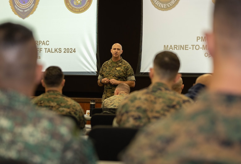 U.S. Marine Corps Col. Christopher Oliver, assistant chief of staff, G-5, U.S. Marine Corps Forces, Pacific, gives a speech during staff talks on Camp H.M. Smith, Hawaii, Feb. 13, 2024. These annual meetings promote military interoperability, strengthen relationships, and expand military capabilities among participating forces in the advancement of a Free and Open Indo-Pacific. (U.S. Marine Corps photo by Lance Cpl. Matthew Benfield)