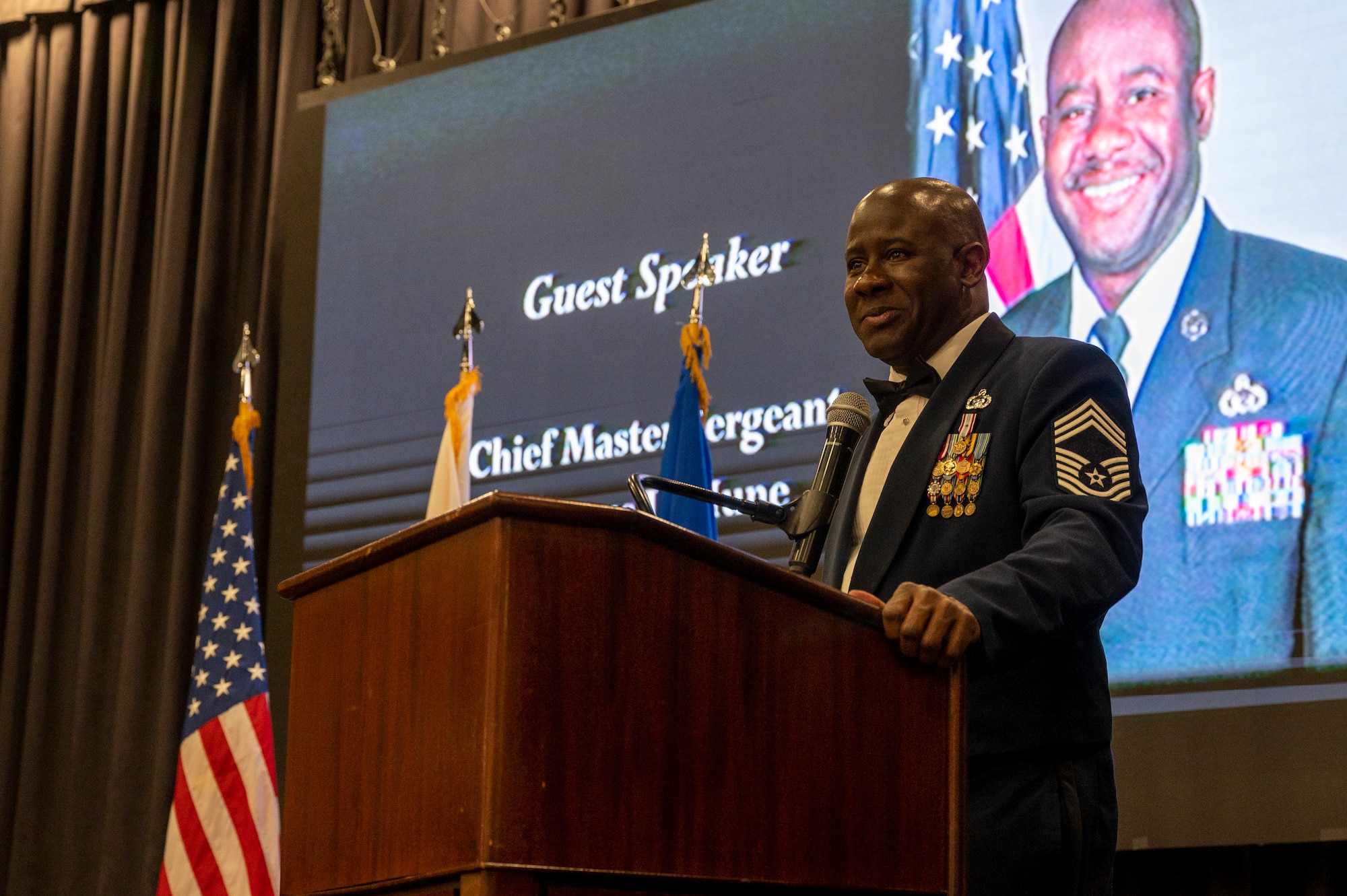 U.S. Air Force Chief Master Sgt. Tavarus D. Hune, Seventh Air Force Intelligence Directorate senior enlisted leader, gives his remarks during the Airman Leadership School Class 24-A graduation at Osan Air Base, Republic of Korea, Feb. 15, 2024. Hune spent five weeks mentoring the students on professionalism, leadership skills and future management challenges. (U.S. Air Force photo by Senior Airman Kaitlin Castillo)