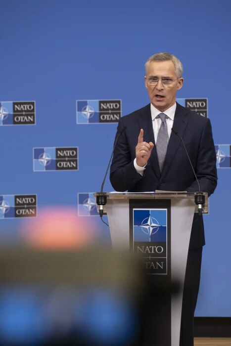 A man stands at a podium.