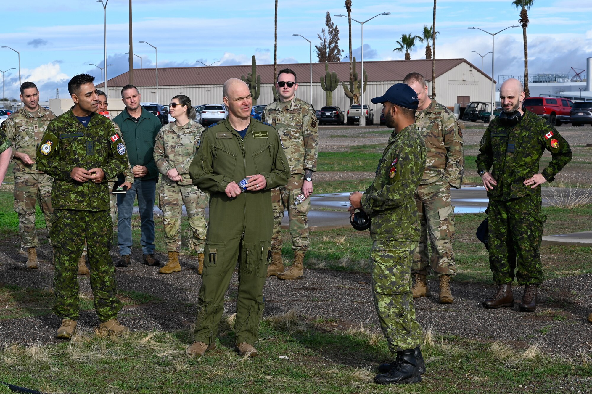 Royal Canadian Air Force airmen from 42 Radar Squadron brief Col. David Turenne, 4 Wing commander, during exercise Phoenix Sunrise, Jan. 19 - Feb. 17, 2024, at Luke Air Force Base, Arizona.