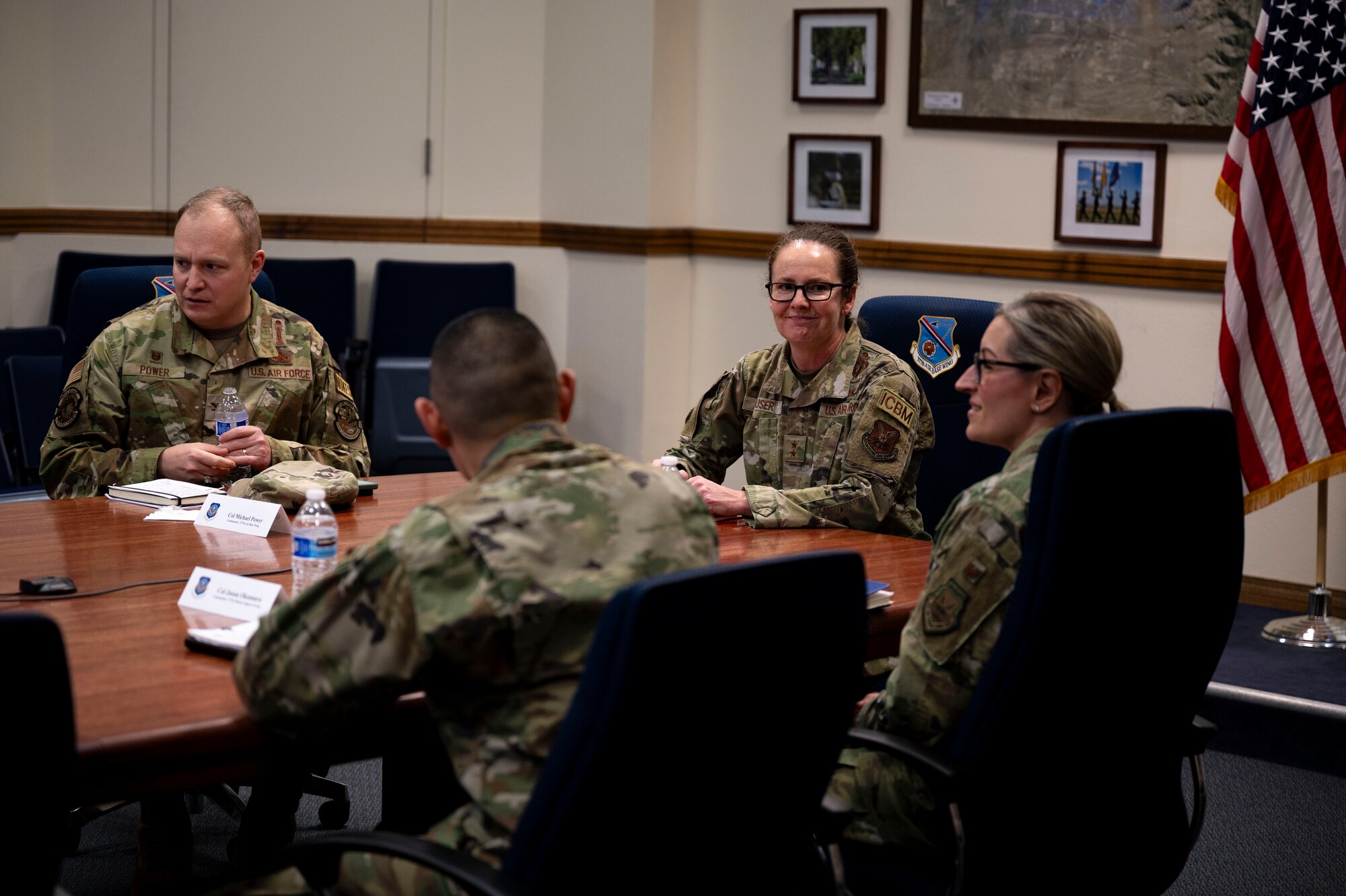 A woman speaks to a group.