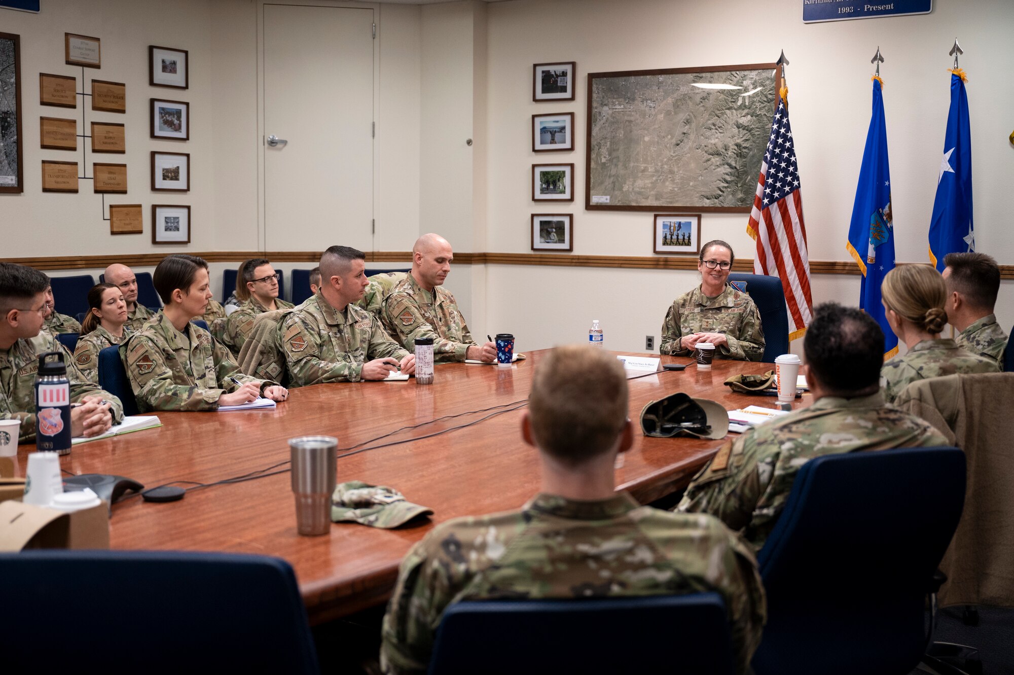 A woman speaks to a group.